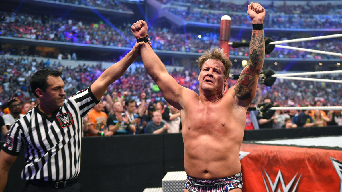 Countering the Phenomenal Forearm with a mid-air Codebreaker, Jericho soaks in a victory over The Phenomenal One.