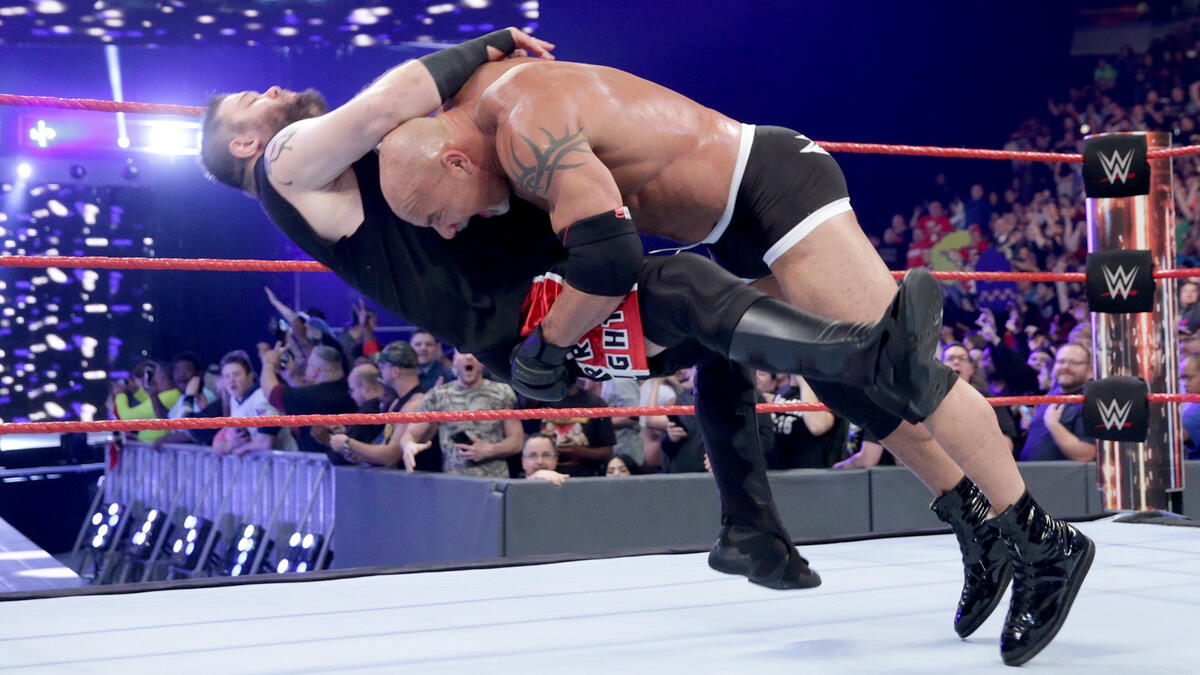 Distracted by the arrival of Y2J, Owens takes his eyes off Goldberg and gets crushed with a Spear.