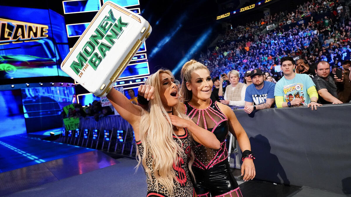 Ms. Money in the Bank & Natalya victoriously exit.