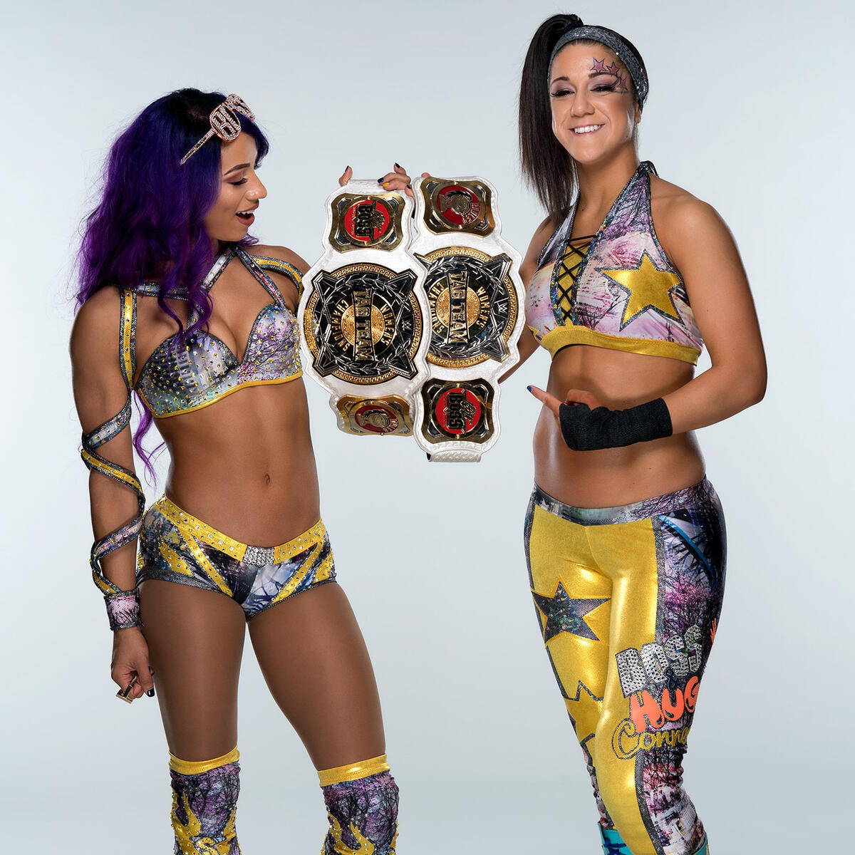 The Boss N Hug Connection Pose With The Wwe Women S Tag Team Titles