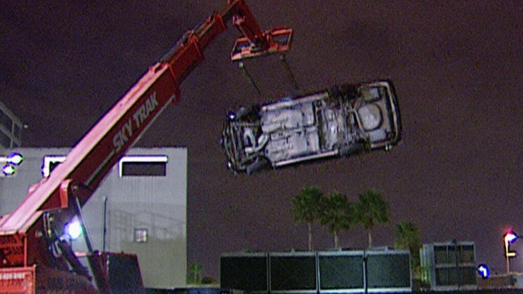 Stone Cold Steve Austin Traps Triple H In His Car And Drops Him High