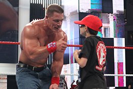 John Cena with a young Cenation member