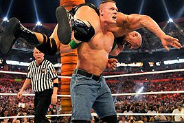 John Cena gives The Rock an Attitude Adjustment