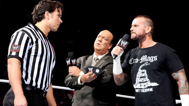 CM Punk, Paul Heyman and WWE referee