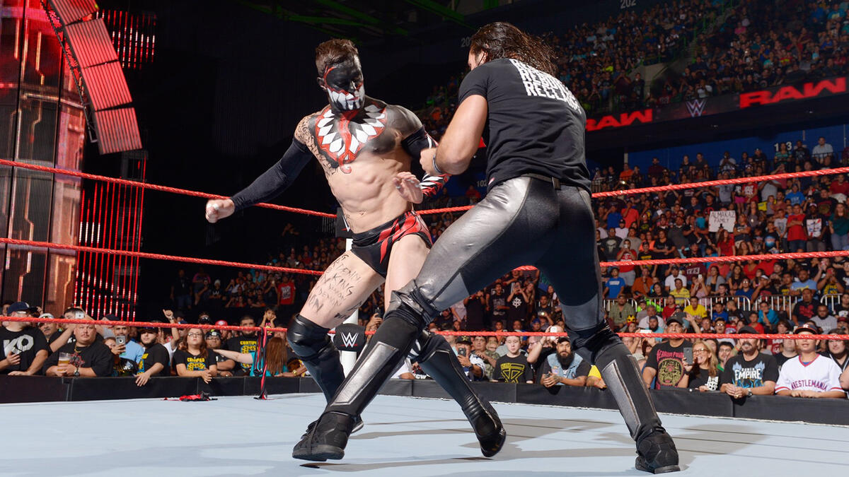 Seth Rollins comes face-to-face with The Demon King: photos | WWE