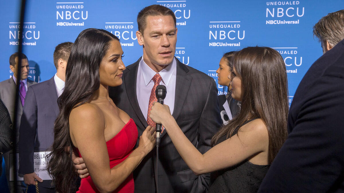 John Cena and Nikki Bella walk the carpet at the 2017 NBCUniversal up