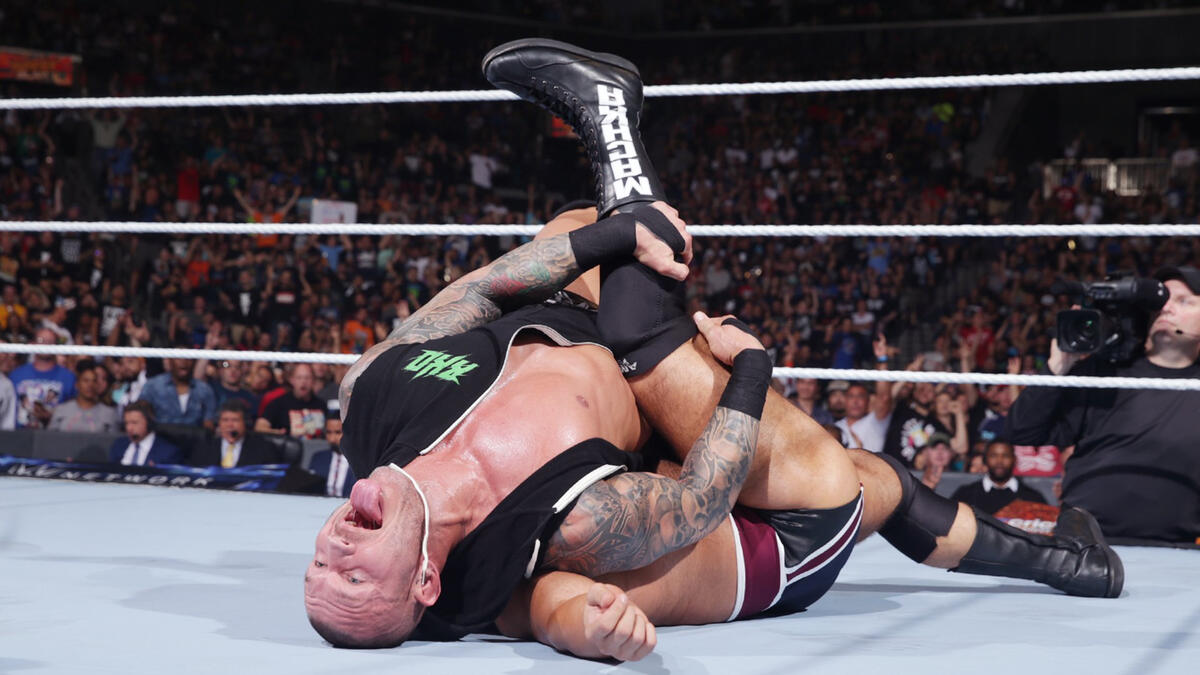 Orton hits a devastating RKO out of nowhere and wins the match in less than 10 seconds!