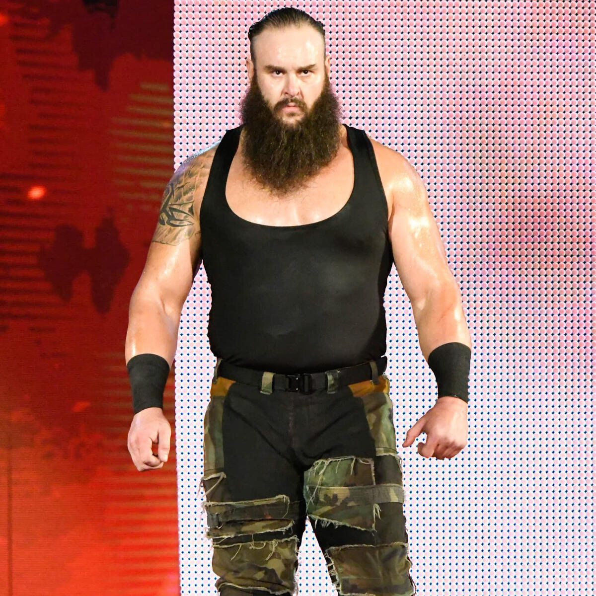 Braun Strowman drives Kane through the ring: photos