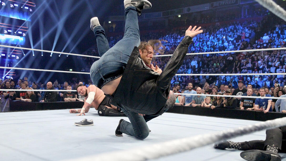 ... but Bryan, seemingly believing Joe was behind him, throws Shane to the canvas!