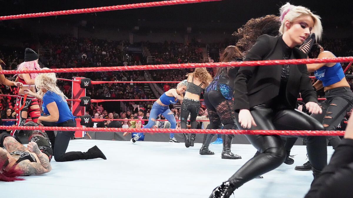 Suddenly, all of the SmackDown women attack the ladies of Raw!