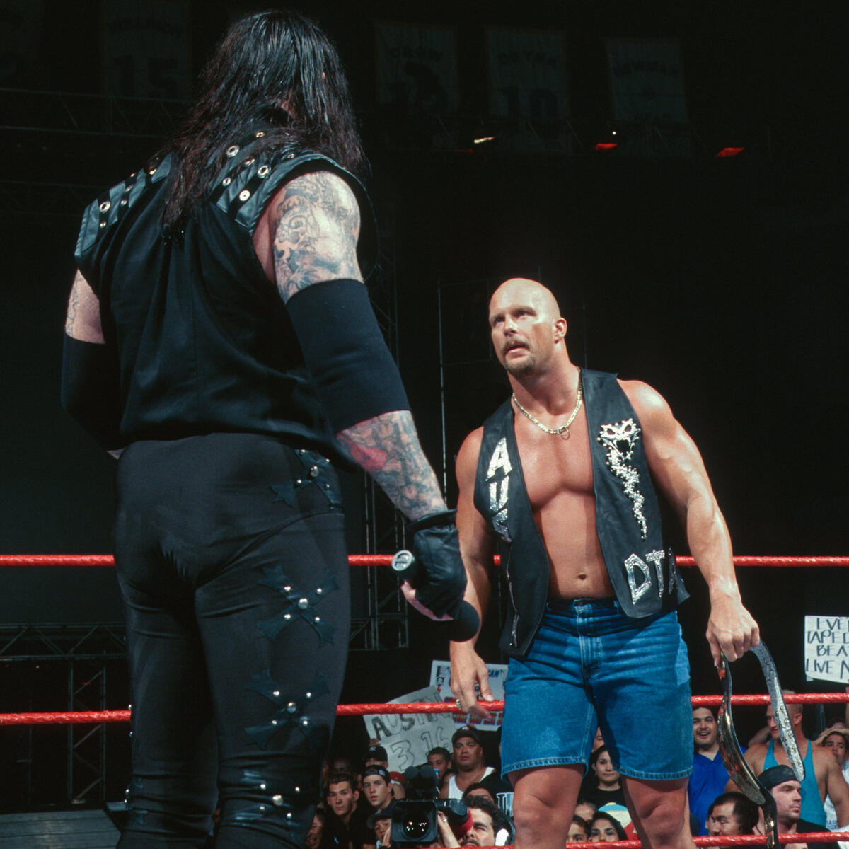 Stone Cold Steve Austin WWE Unsigned Stunner on Undertaker Photograph