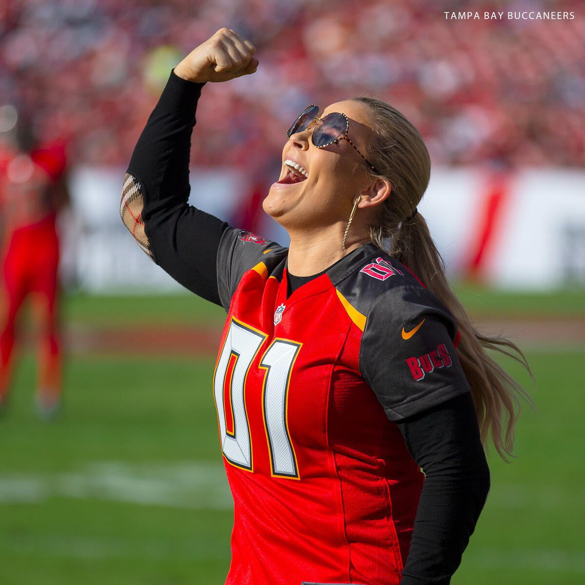 Titus O'Neil, Natalya and Mojo Rawley attend a Tampa Bay