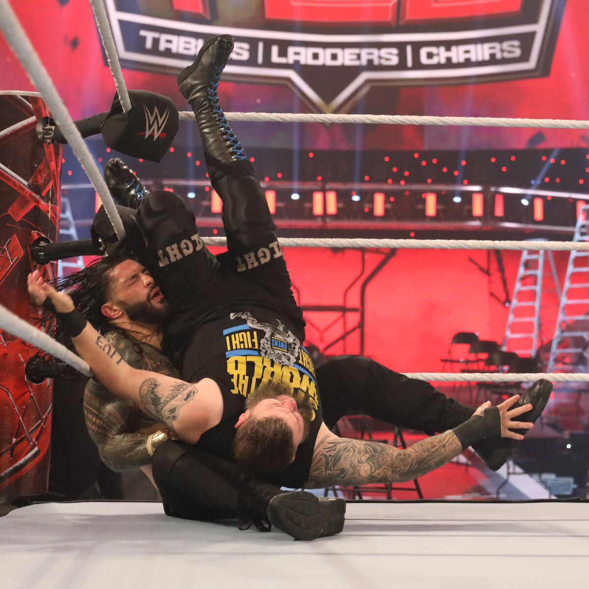 Roman Reigns vs. Kevin Owens Universal Championship TLC Match photos WWE