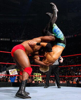 Big Zeke hits Christian with a big slam.