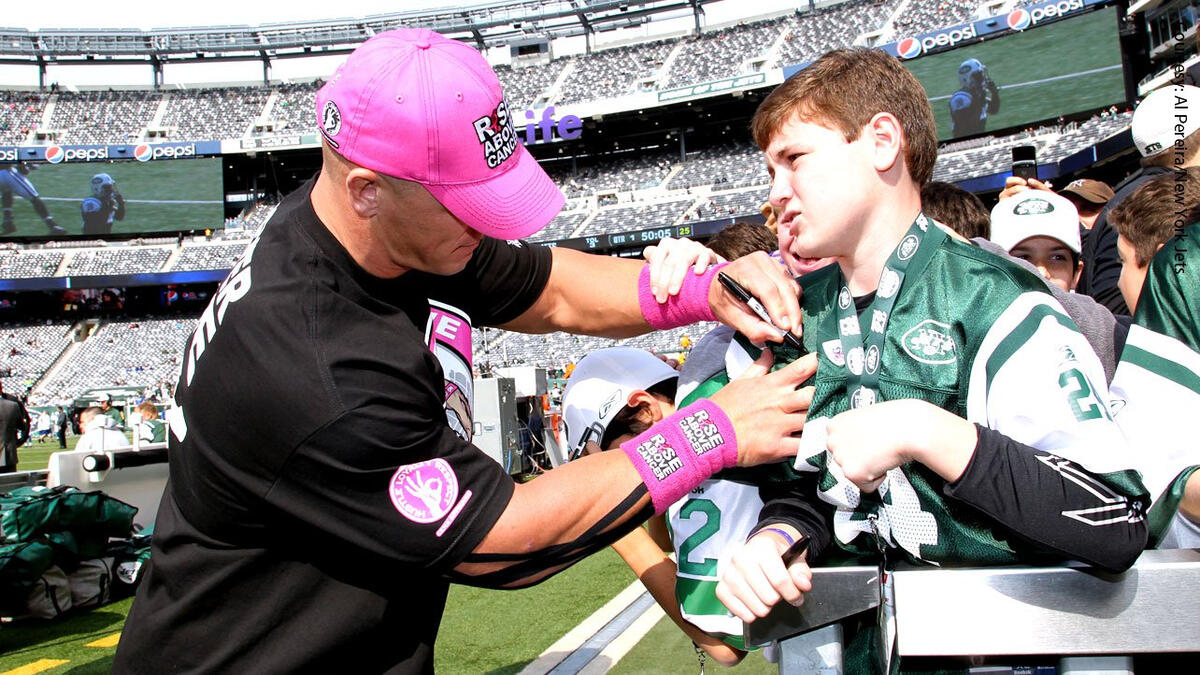 John Cena lines up with the New York Jets for the National Anthem