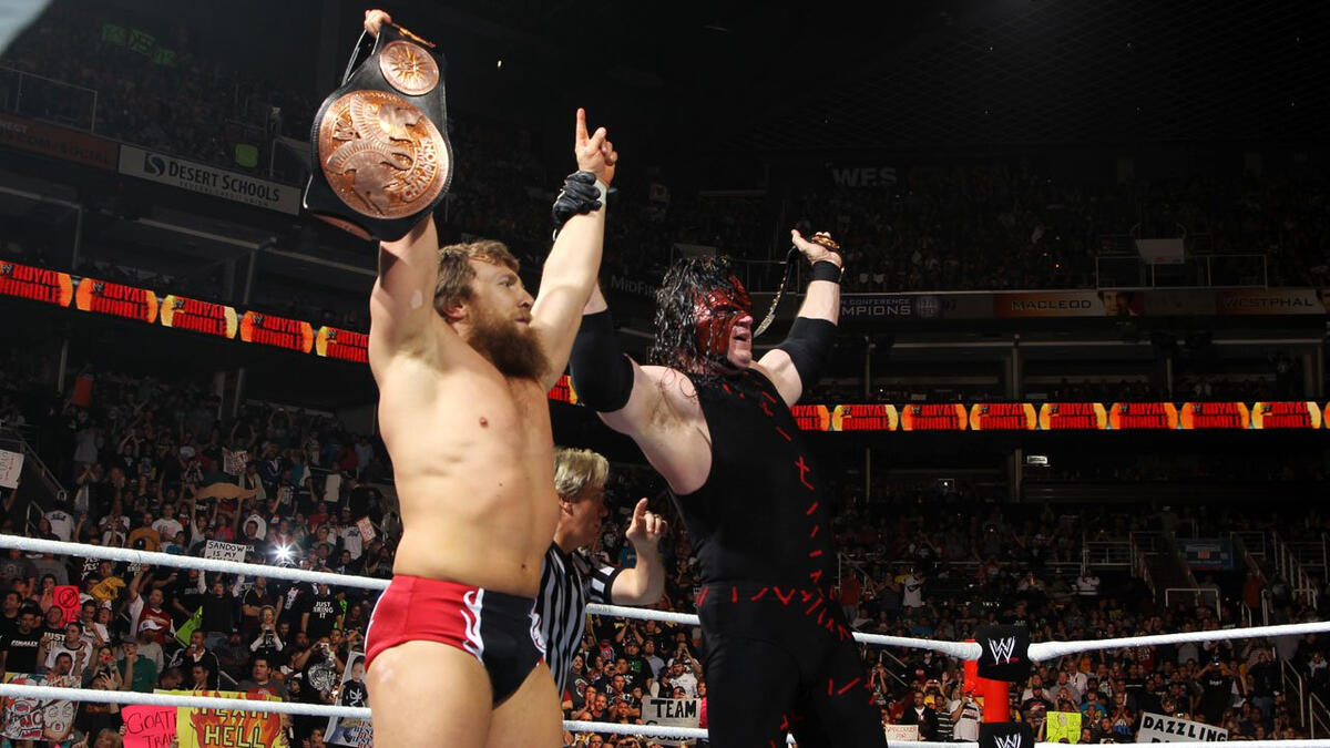 Team Hell No defeats Sandow and Rhodes to retain the WWE Tag Team Championships.