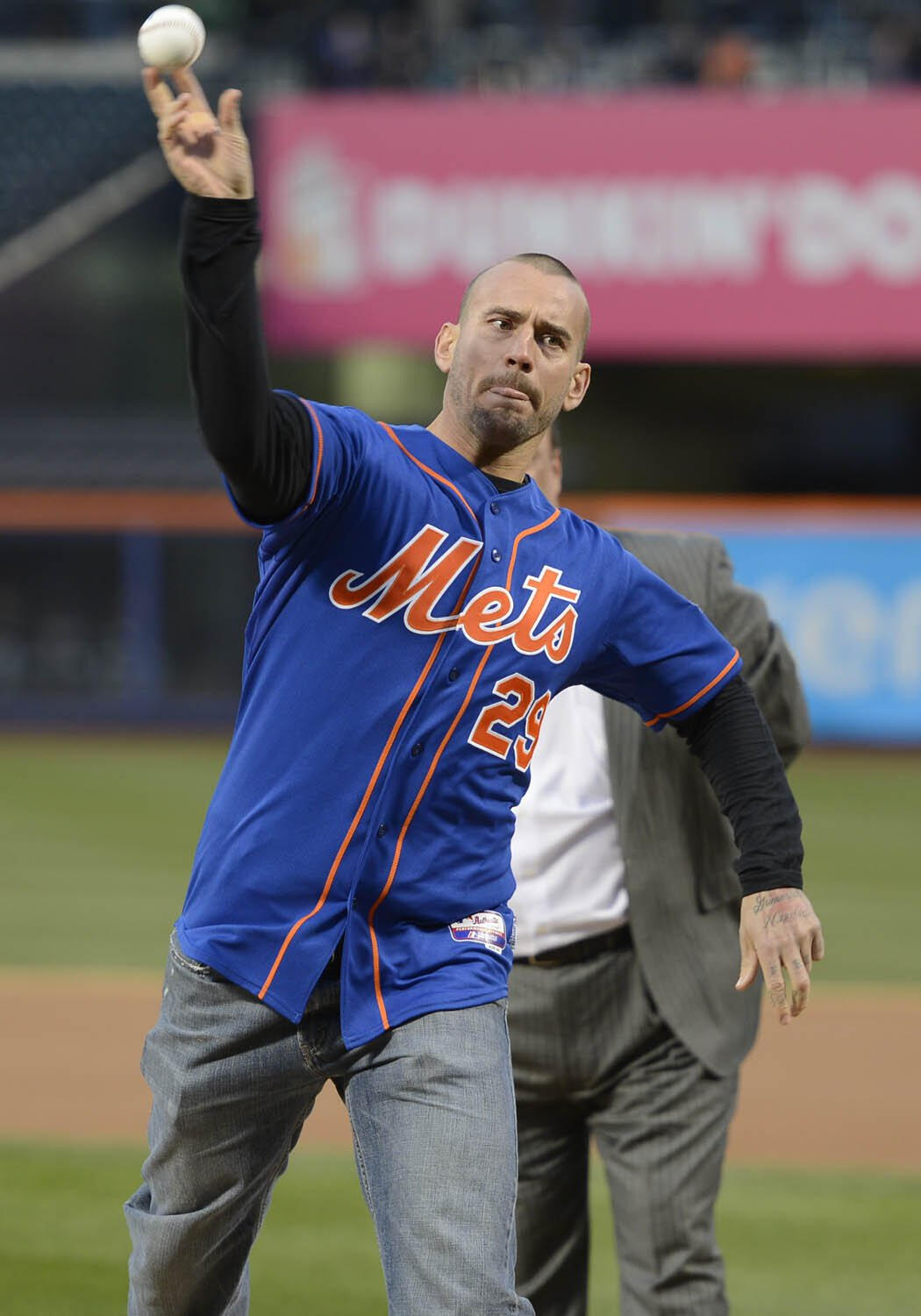 CM Punk throws out the first pitch at the Mets-Marlins game & Santino ...