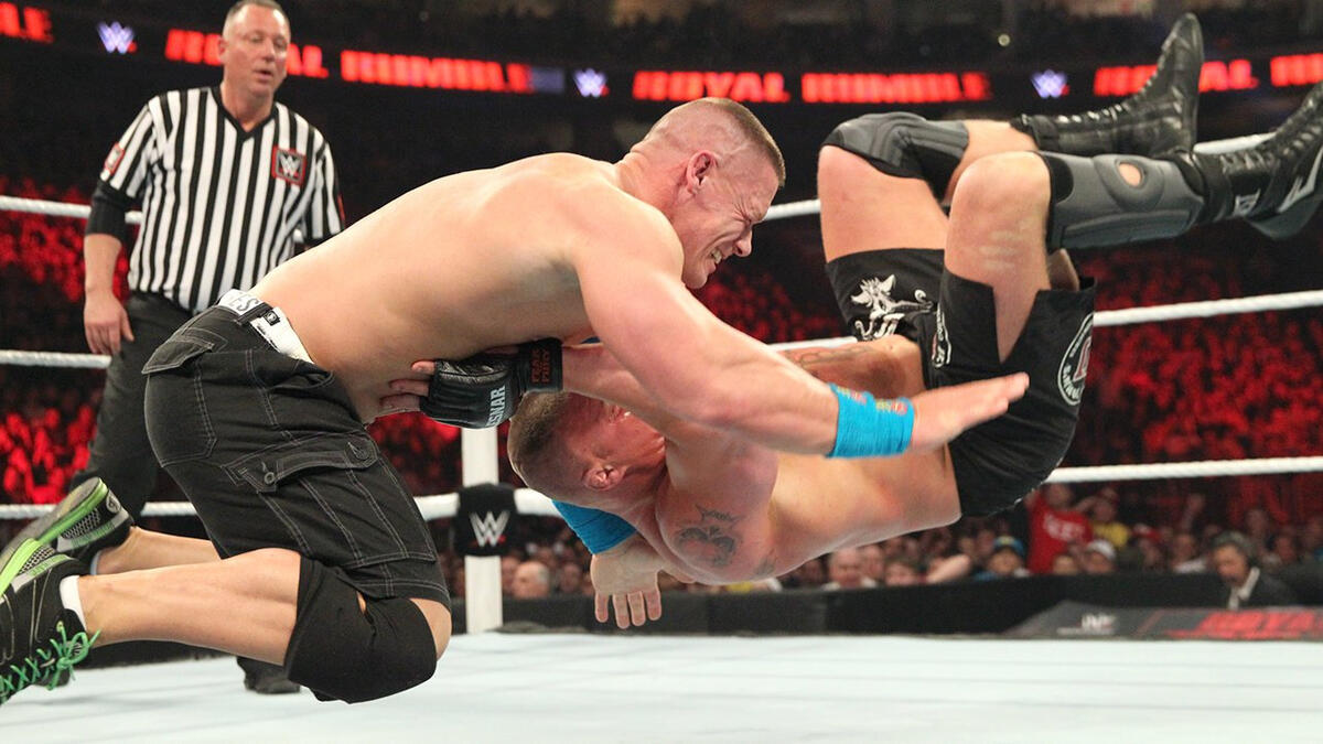 Triple Threat Match for the WWE World Heavyweight Championship: photos ...