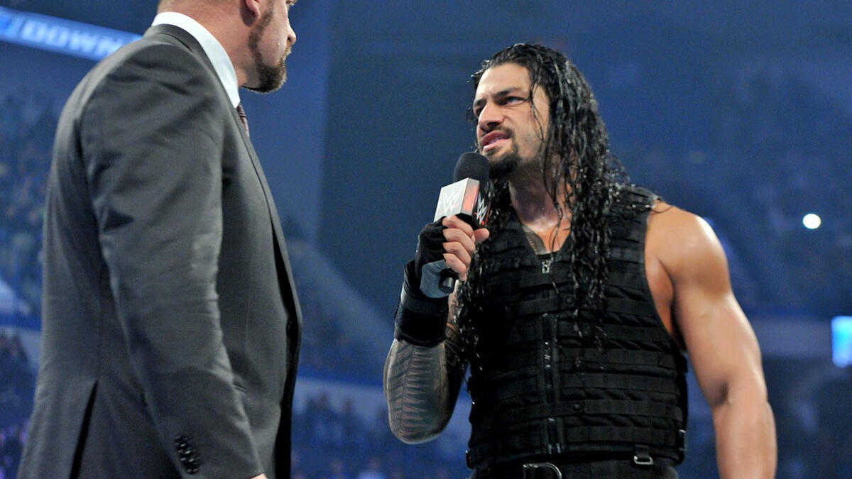 Roman Reigns Interrupts Triple H: Photos | WWE