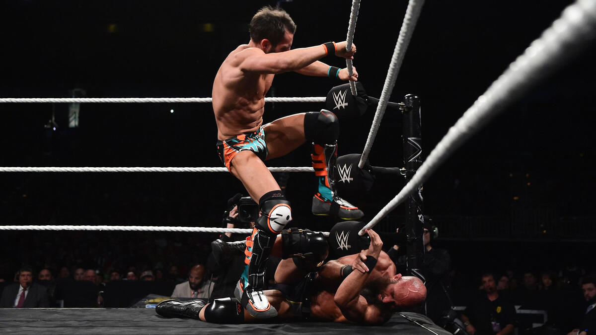 Johnny Gargano repeatedly stomps on Tommaso Ciampa in barbaric ...