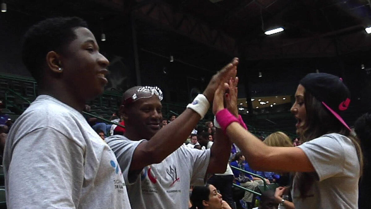 The Bella Twins & Titus O'Neil coach basketball at the Special Olympics ...