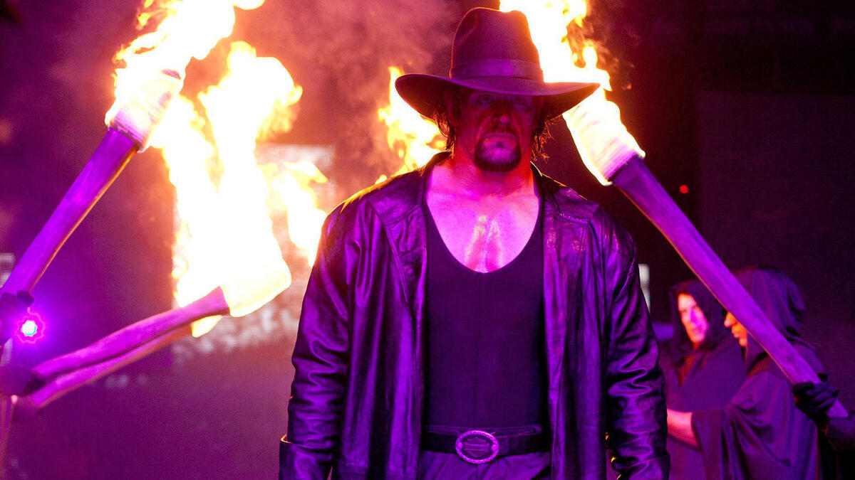 WWE's Undertaker talks Cowboys, Longhorns fandom; what it meant to be part  of Salute to Service game