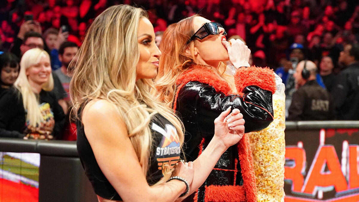 Trish Stratus returns, Lita & Becky Lynch capture WWE Women's Tag Titles on  Raw