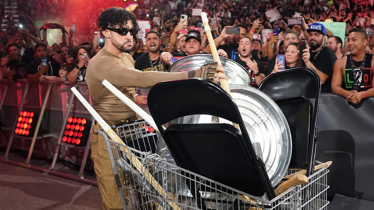 Bad Bunny busts out a trolley full of weapons in electric entrance WWE