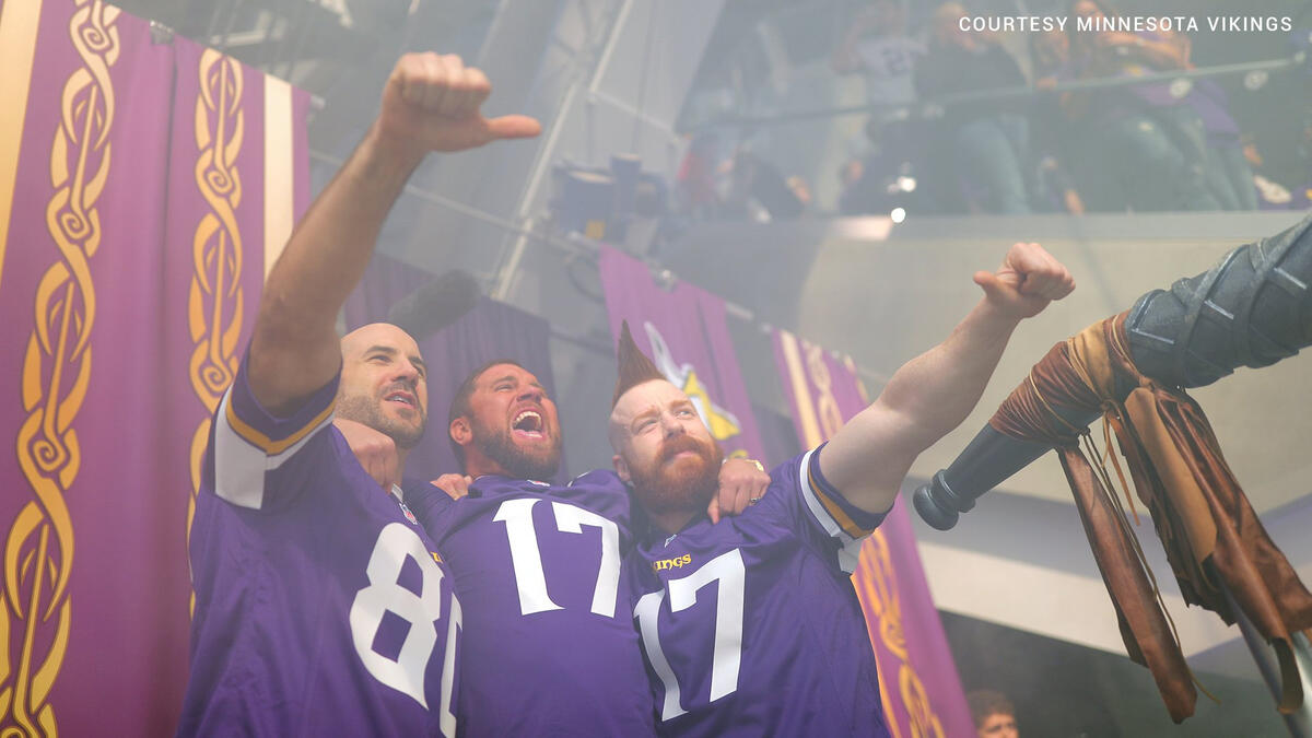 Sheamus, Cesaro and Curtis Axel sound the traditional horn for the Minnesota  Vikings
