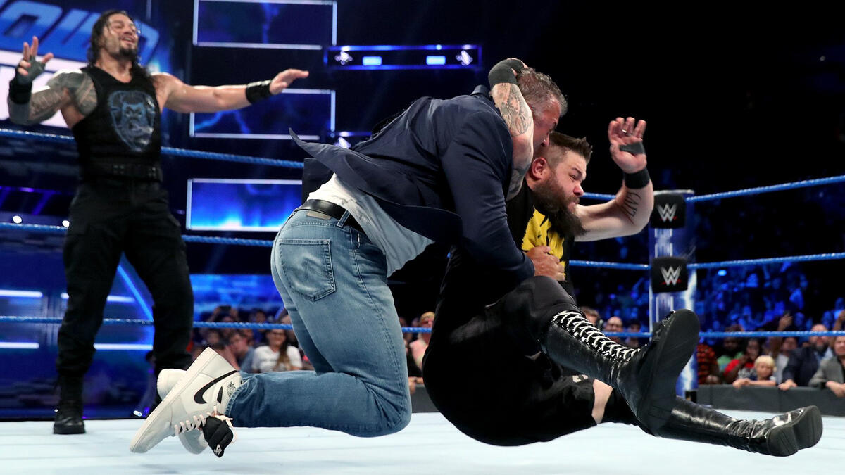 Revel In What You Are sign shown during WWE SmackDown - Wrestling News