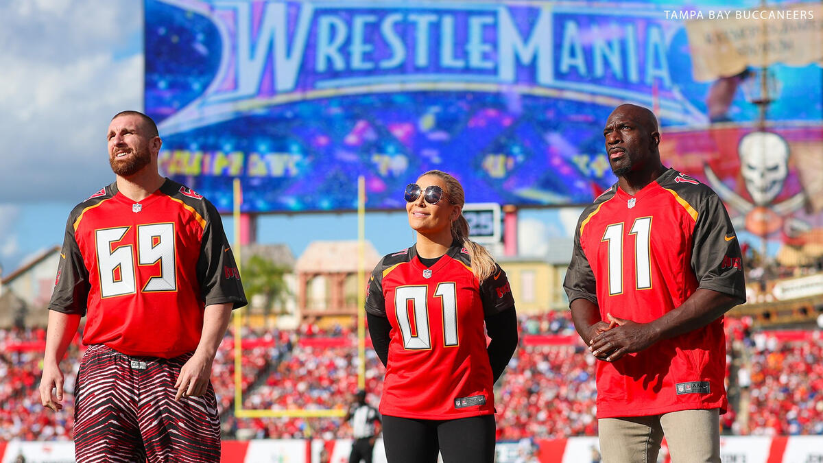 Titus O'Neil, Natalya and Mojo Rawley attend a Tampa Bay