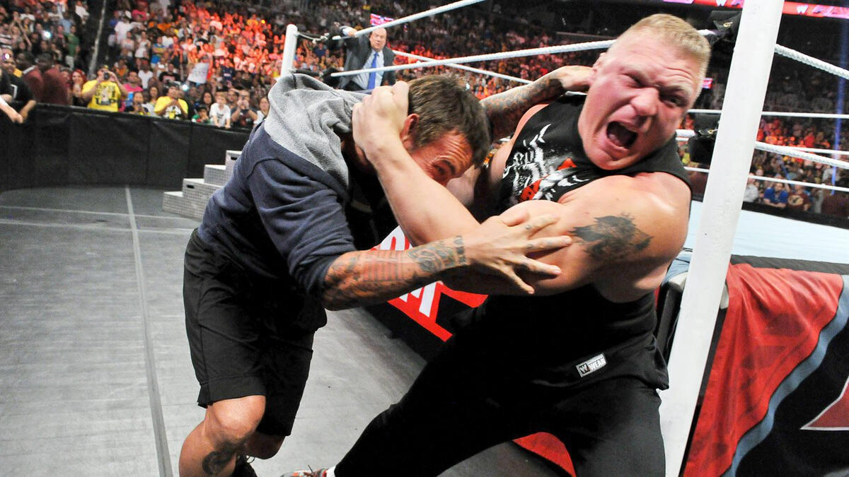 CM Punk injured by Brock Lesnar on Raw | WWE