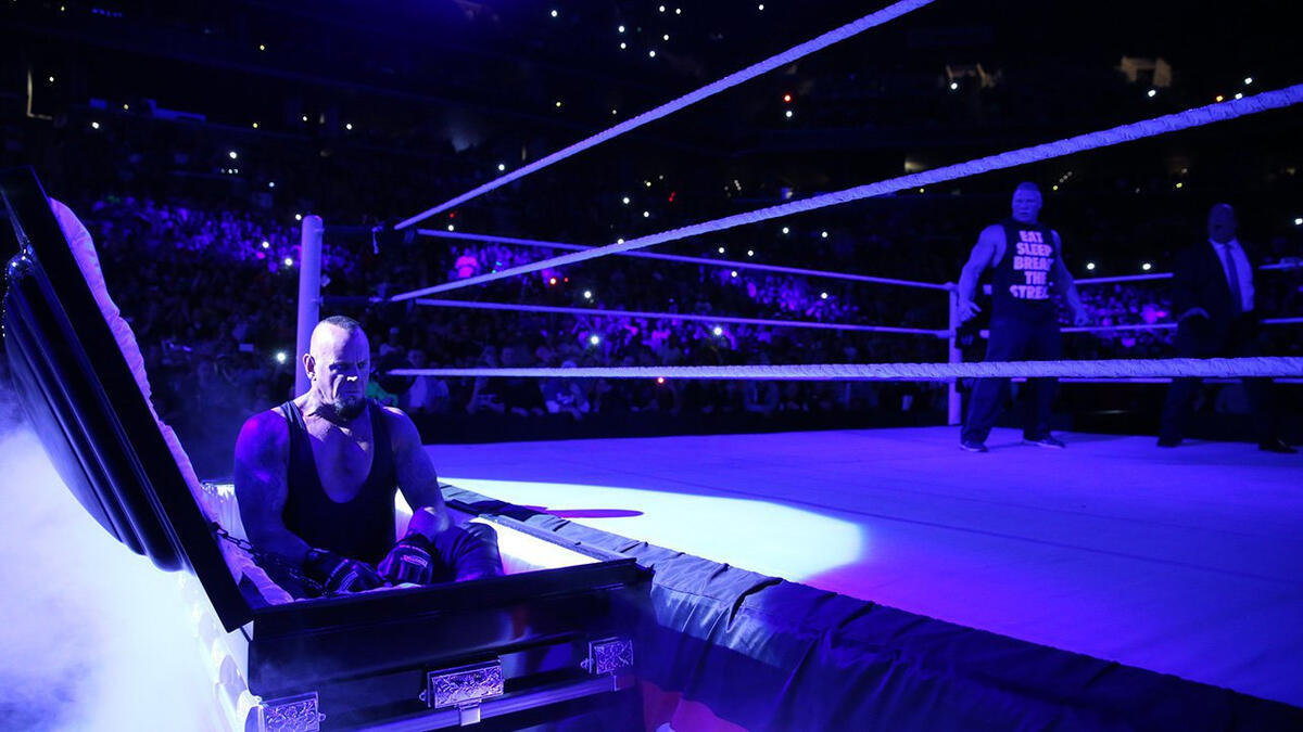 The Undertaker rises from a coffin to attack Brock Lesnar: photos | WWE