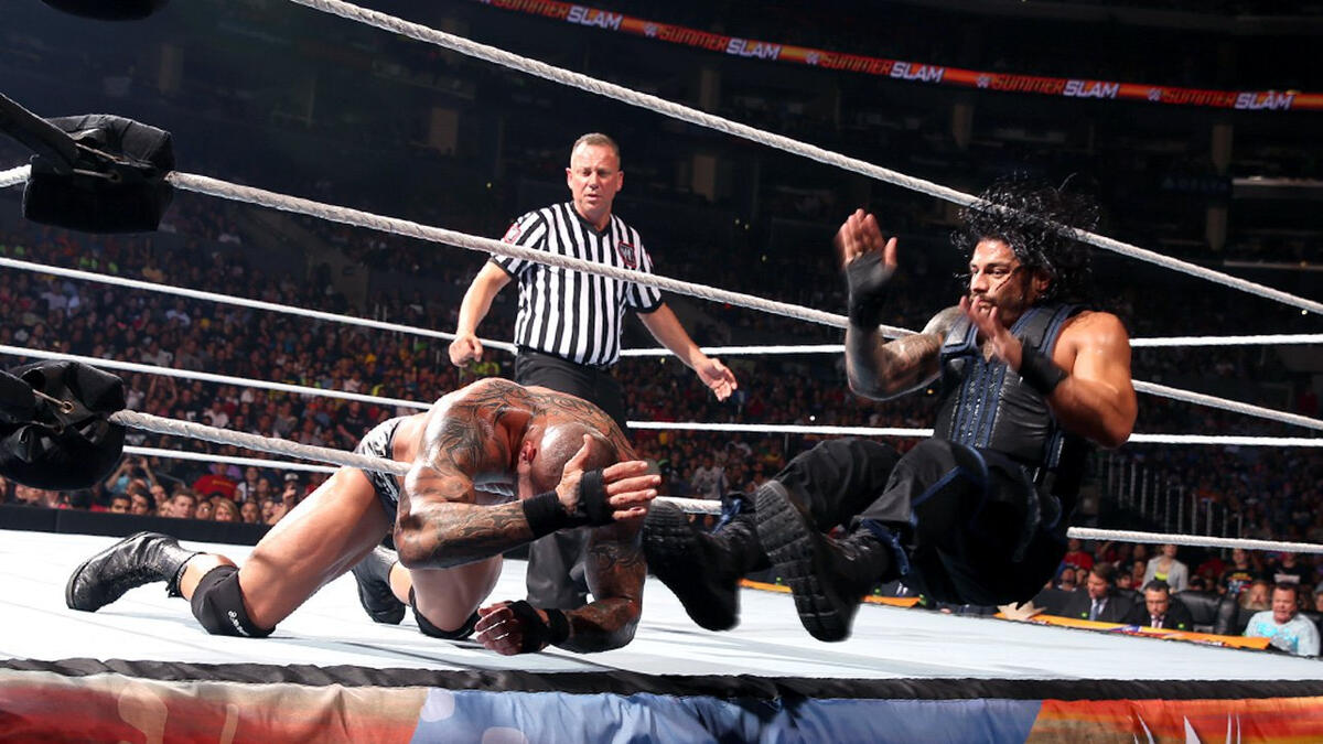 Roman Reigns vs. Randy Orton photos WWE