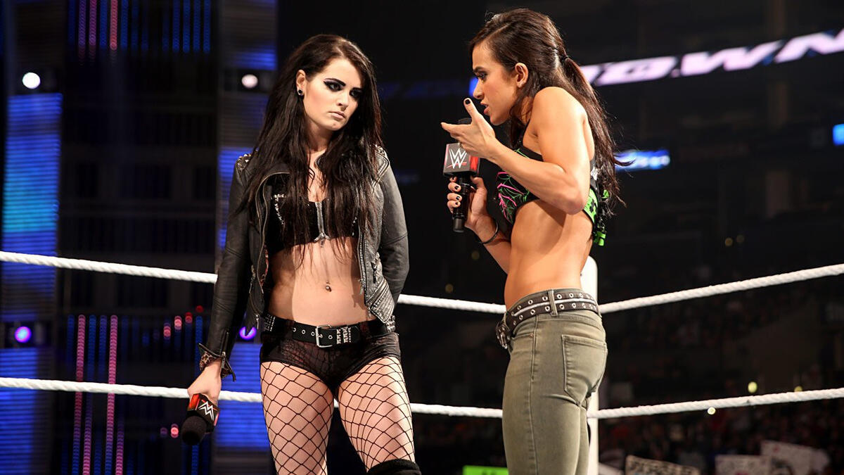 Aj Lee And Paige Unite In A War Of Words With Nikki And Brie Bella Photos