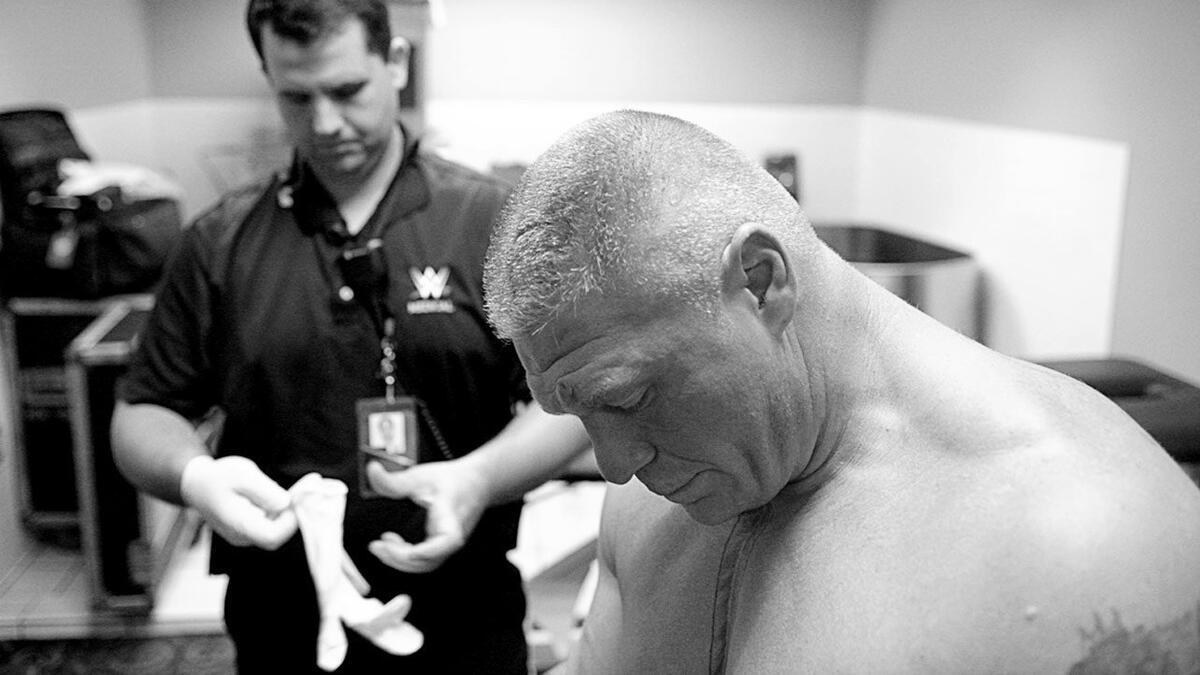Brock Lesnar injury photos WWE