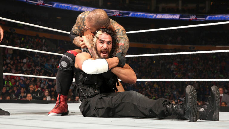 CM Punk and Drew McIntyre torch each other before Rollins crashes the ...